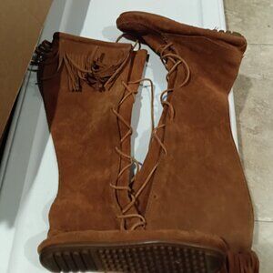 Tall moccasin boots